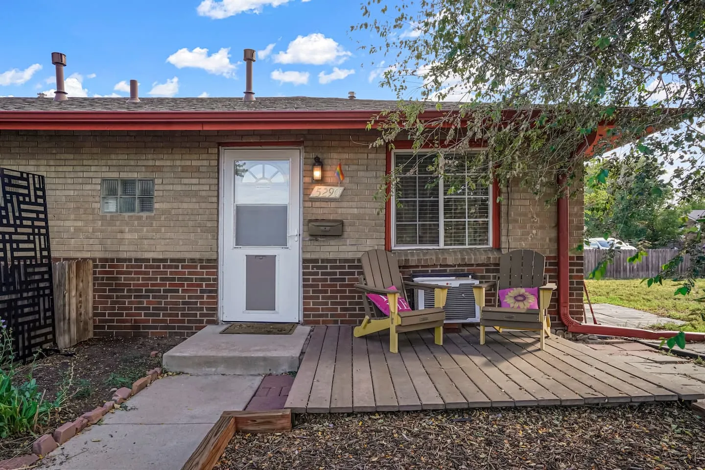 Private front deck with Adirondack chairs