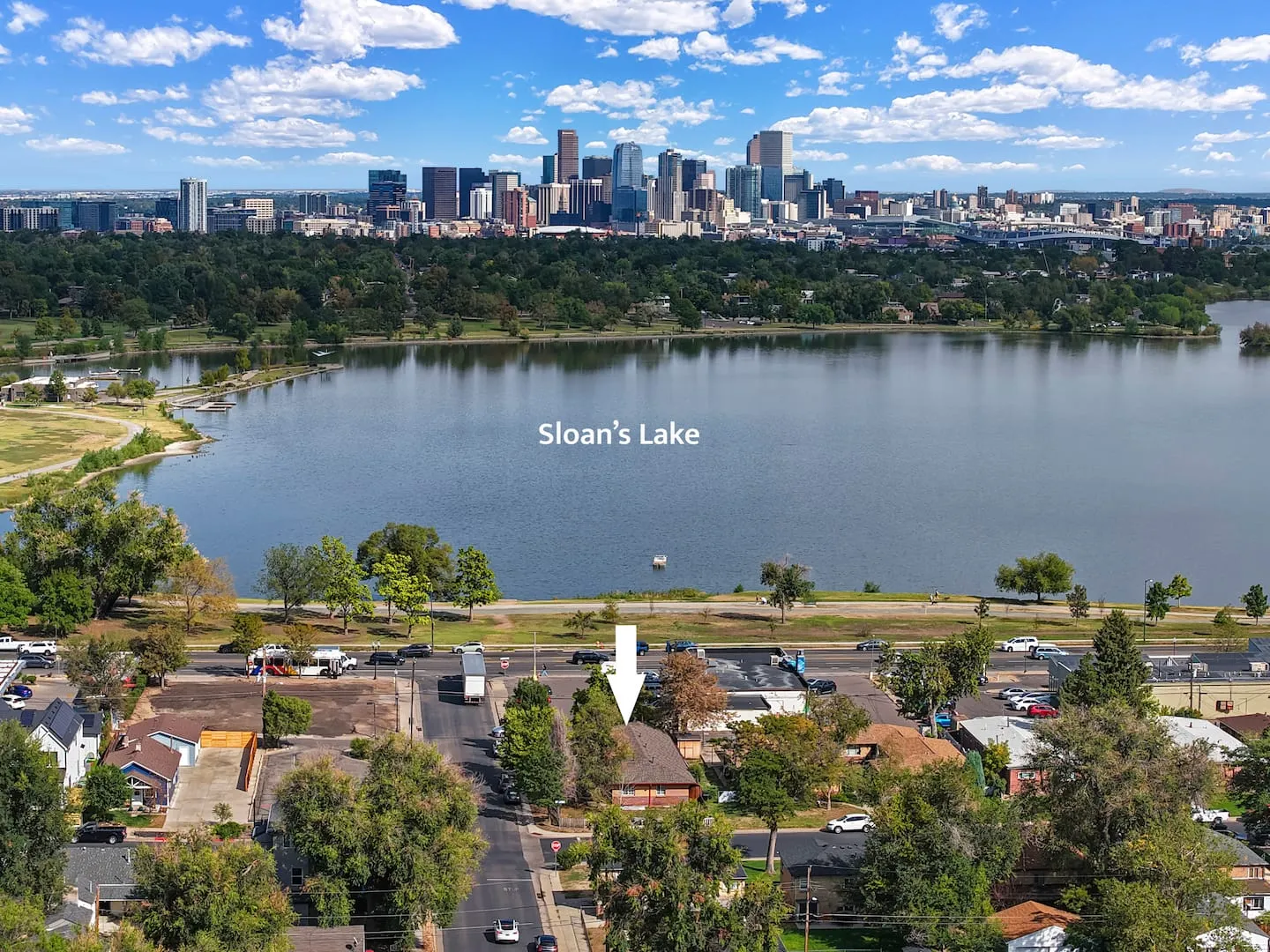 Aerial view of Sloan's Lake and the Denver skyline, one block from the home