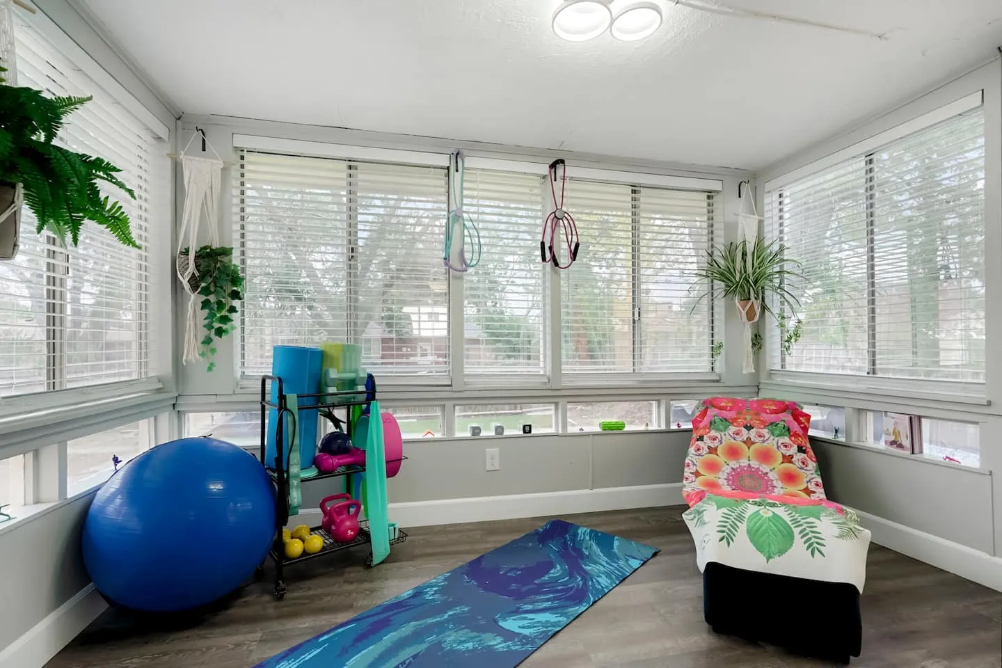 Furnished sunroom at the back of the house